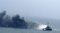 Handout picture showing car ferry Norman Atlantic burning in waters off Greece